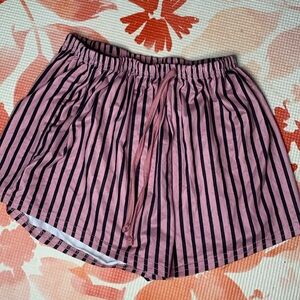 Pink and black striped shorts